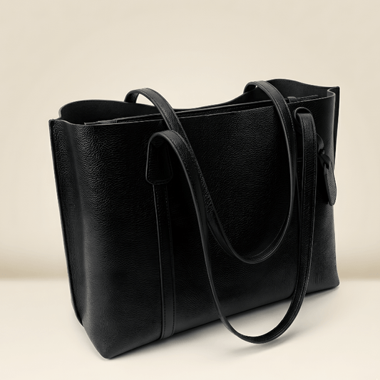 Textured black leather tote bag with dual handles